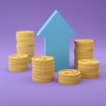 Stacks of coins with an upward arrow representing cryptocurrency growth