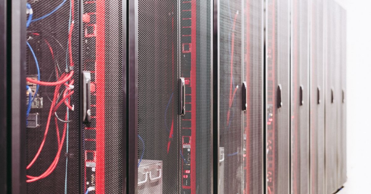Server racks in a data centre representing a blockchain database