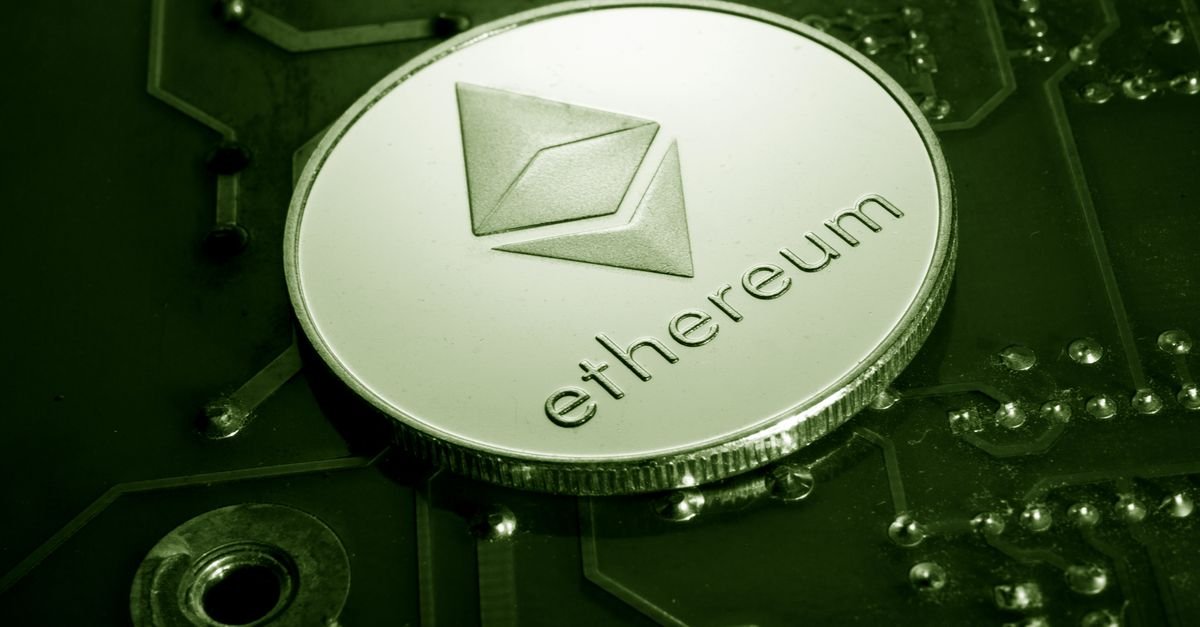 Close-up of an Ethereum coin on a circuit board